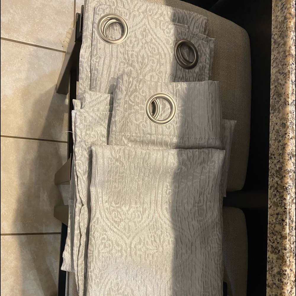 Gray/silver grommet panels